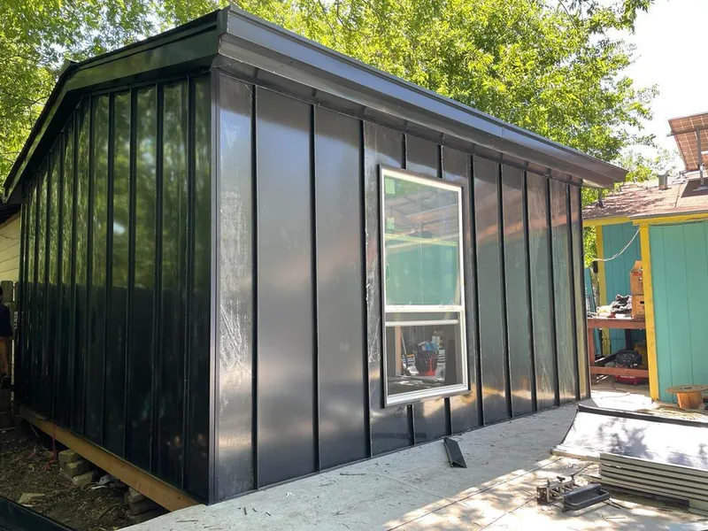 Black standing seam metal wall panels for Metal Roof Installation in Schiller Park